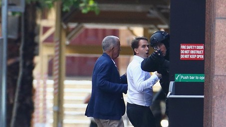 Hostages Flee From Gunman in Sydney Cafe as Siege Continues